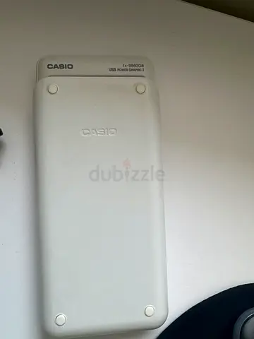 Casio scientific/graphing calculator (used) with cover