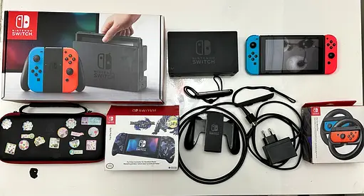 Switch with accessories for sale.