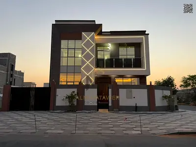 Luxury villa for sale in Al Yasmin with a modern design and spacious areas, prime location close to