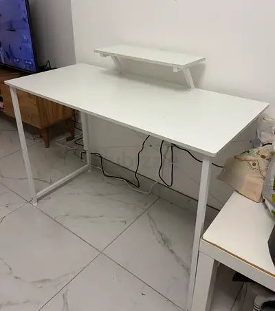 White minimal computer/office desk with raised monitor shelf