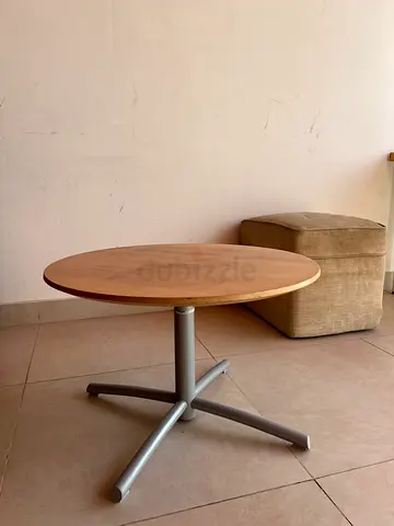 Small round wooden side table with metal base