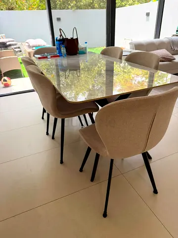Glass Dining Table with 6 Upholstered Chairs – Masaar Sharjah