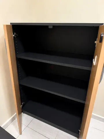 Tall wooden storage cabinet with 3 adjustable shelves — good condition
