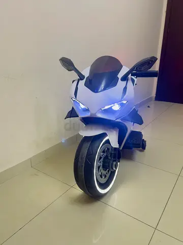Kids Electric Ride-On Sports Bike  | White | LED Lights | Battery Powered | Excellent Condition