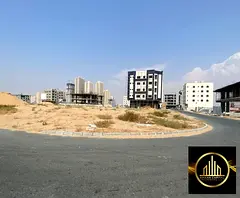 Residential and commercial plot on the corner of two streets (G+4) in a prime location in Global Cit