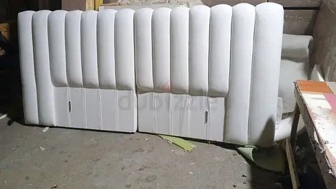 King-size upholstered headboard in white - good condition