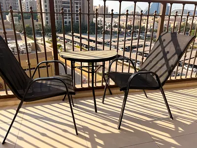 Small outdoor bistro set — 2 mesh chairs + round table