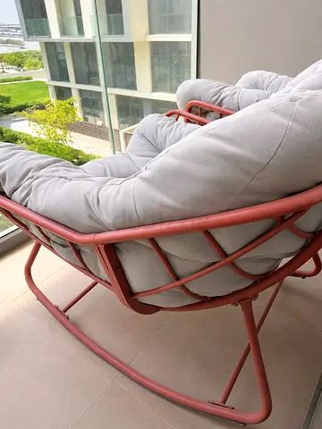 Comfortable Red Metal Rocking Lounger with Thick Grey Cushion
