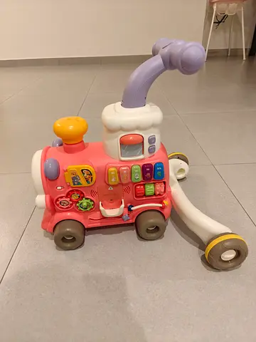 Pink baby activity walker with lights and music - very good condition