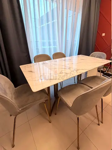 6-piece marble-top dining table with upholstered chairs (like new)