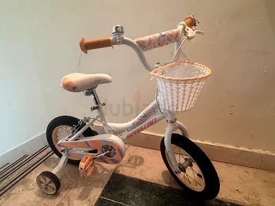 White girls' 12-inch children's bike with training wheels and basket helmet
