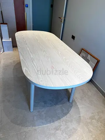 Brand new 8 seater,Light wood oval dining table