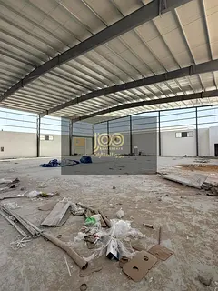 A detached warehouse on a main street with a setback, suitable for all commercial and industrial act