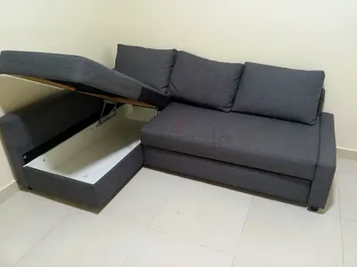 Grey L-shaped storage sofa bed - good condition