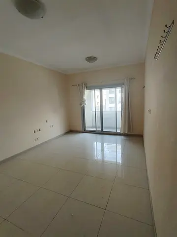 شقة غرفة وصالة للإيجار السنوي في التعاون | مطبخ أمريكي | بلكونتان | 2 حمام | 35,000 درهم