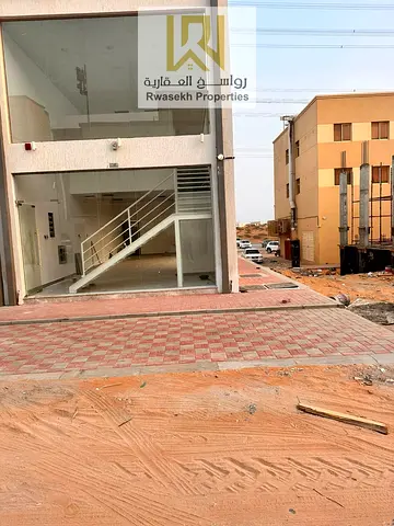 Commercial Showroom for Rent | Corner Unit | Ground Floor + Mezzanine | Prime Location in Al Yasmeen, Ajman