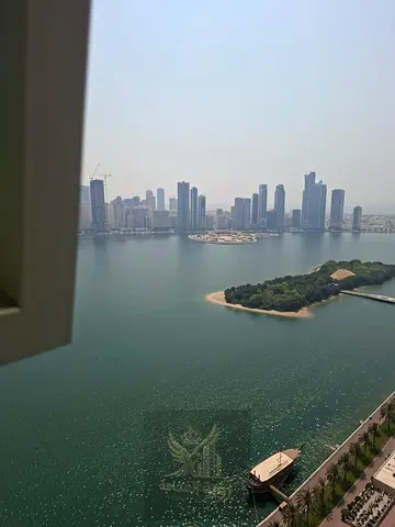 Luxury Two Bedroom Apartment for Annual Rent in Al Majaz 1 Direct Sea View Two Master Bedrooms Balcony Laundry Room Free Gym Pool Parking Flexible Pay