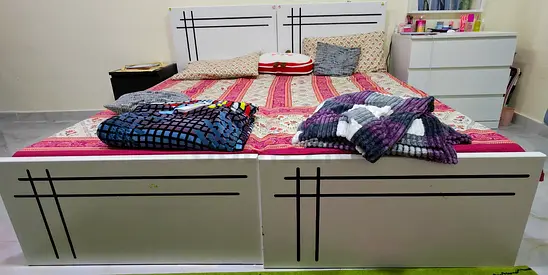 White double bed frame with headboard and storage footboard - excellent condition.