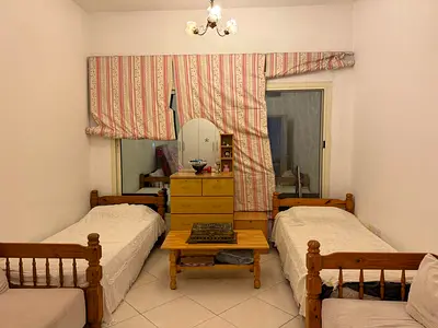 2 single wood bed with matresses and mirorr cabinet