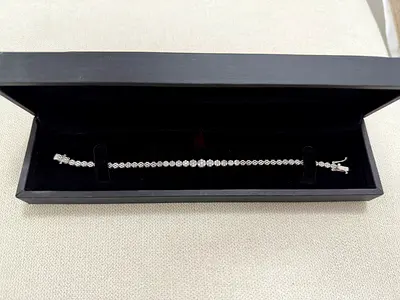 Silver tennis bracelet with clear stones - excellent condition