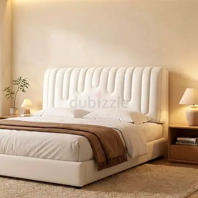 Modern upholstered queen bed with padded headboard - cream