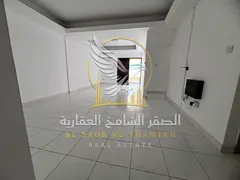 Two-bedroom apartment with a living room and balcony in Sharjah; includes two bathrooms; contract su
