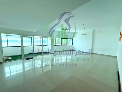 Two bedroom and living room for annual rent in Al Mamzar Sharjah Free gym swimming pool and parking Two balconies Open view Three bathrooms Huge