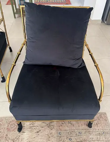 Pair of black velvet cushioned arm chairs