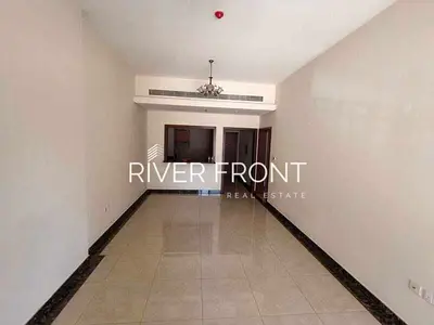 شقة فسيحة بغرفة نوم واحدة | بانثيون بوليفارد JVC | شرفة وإطلالة على المدينة | غير مفروشة