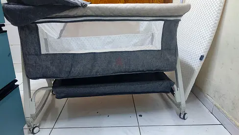 Grey Baby Bassinet with Storage and Wheels