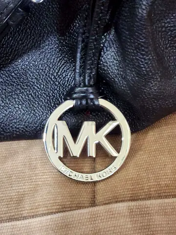 Michael Kors black leather shoulder bag - authentic logo charm