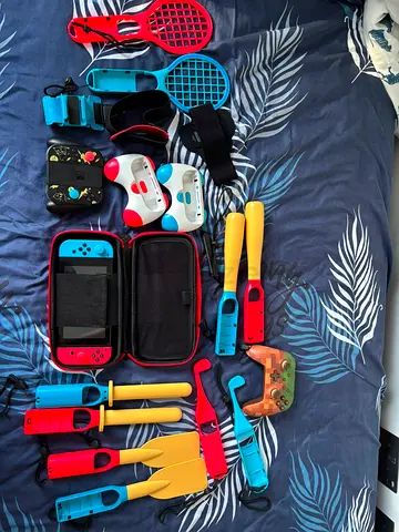 Nintendo Switch (V1) Bundle with Extra Controllers & Sports Accessories