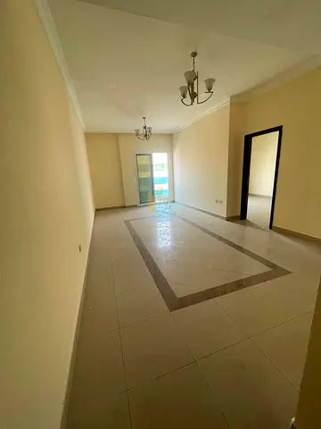 For Rent | 1-Bedroom Apartment with Parking in Al Taawun