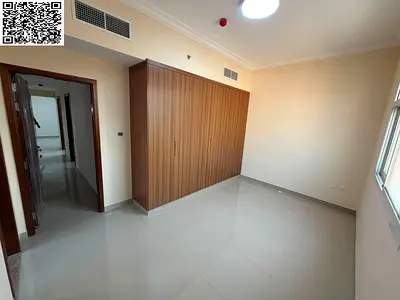 For annual rent: Two bedrooms, a living room, three bathrooms, a balcony, and a kitchen. Spacious a