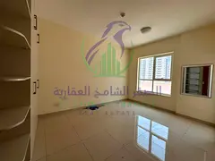 Spacious Two Bedroom Apartment with Balcony and Parking with Built in Wardrobes in Prime close to Du