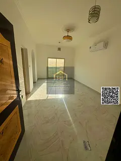 Two-bedroom apartment with a living room for annual rent in Al Rawda 2, Ajman, in a prime and conven