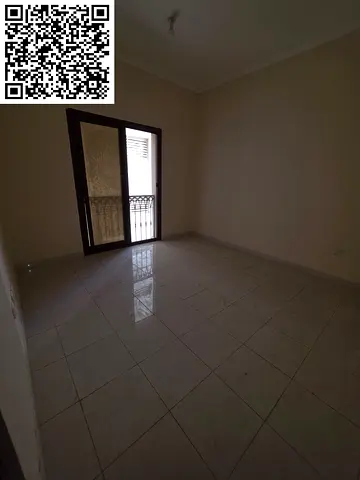 For annual rent: One bedroom and living room with balcony, Al Nuaimiya 1, on Sheikh Khalifa Street