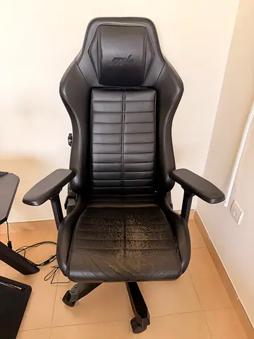 Used black Dx Racer Master Series gaming/PC racing-style chair with armrests - used condition