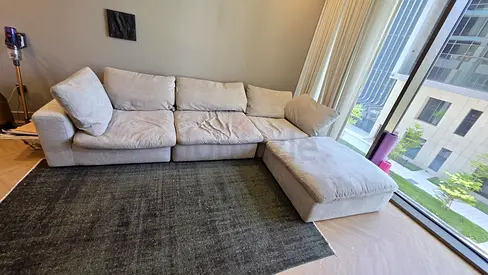 Comfortable pan Emirates Pianca corner feather filled sofa with footstool
