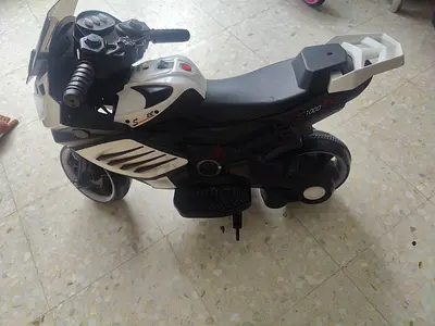 Kids Electric Ride-On Motorcycle Toy - White/Black, Good Condition