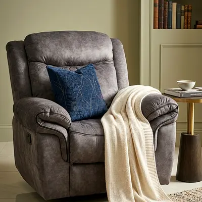 Comfortable grey single recliner armchair with no wear and tear