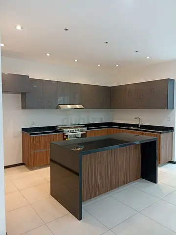 Modern kitchen  island with storage cabinets and top marble and sides