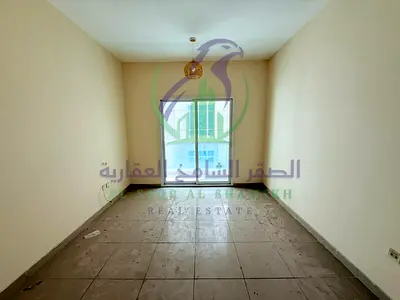 شقة غرفتين وصالة للإيجار في التعاون شارع رئيسي تكييف مجاني باركينغ جيم ومسبح مساحات واسعة جاهزة للسكن موقع مميز للعائلات