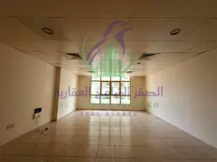 Spacious studio for rent in Al Majaz 2 on Jamal Abdul Nasser Street, featuring a separate kitchen, l