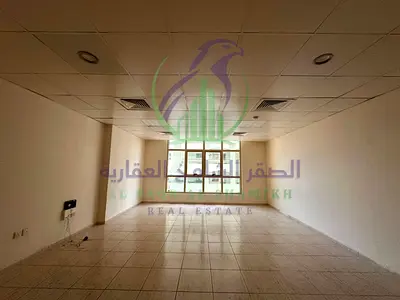 Spacious studio for rent in Al Majaz 2 on Jamal Abdul Nasser Street, featuring a separate kitchen, large bathroom, and excellent location