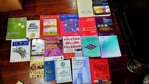 Collection of university textbooks and business books - assorted titles