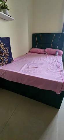 Queen size upholstered bed with headboard - good condition