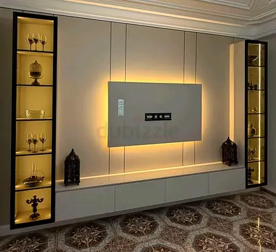 Modern wall-mounted entertainment unit with illuminated display shelves