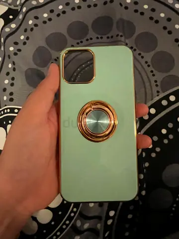 Mint green iPhone case with built-in ring holder (good condition)