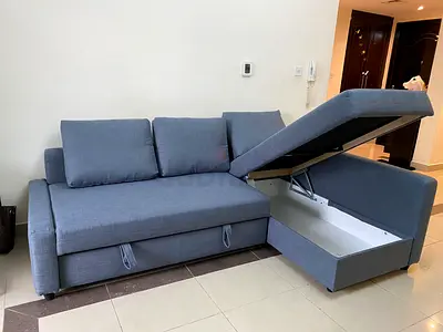 Grey L-shaped Sofa Bed with Under-seat Storage - Good Condition